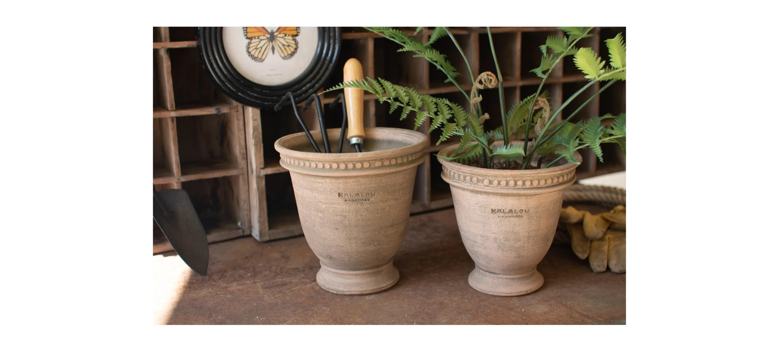 clay pot with stamped kalalou logo